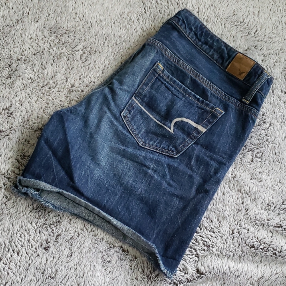 Distressed denim shorts
